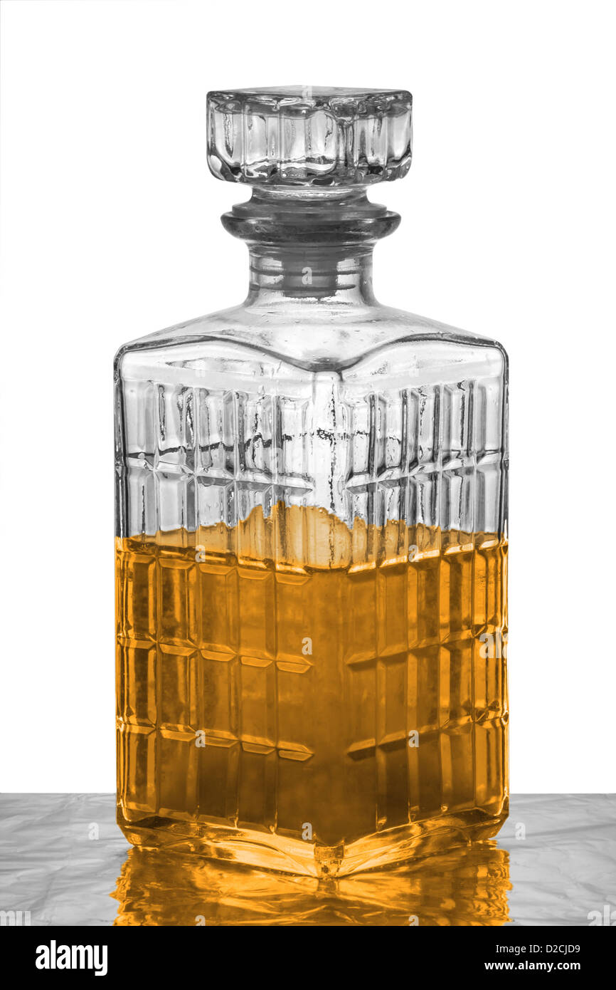 A crystal carafe filled with whiskey Stock Photo