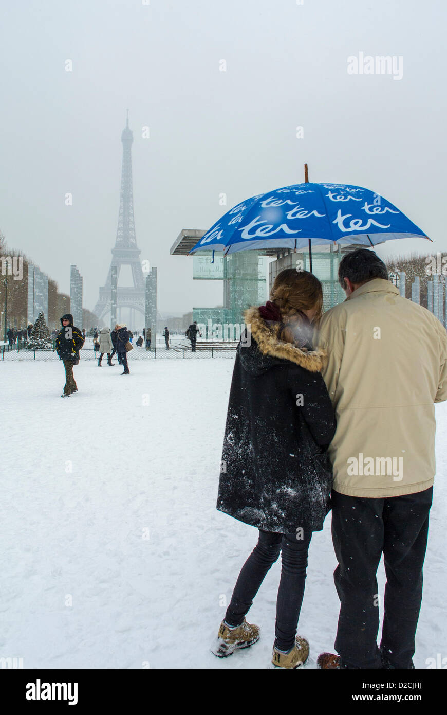 Romantic couple snow rear view hi-res stock photography and images - Alamy