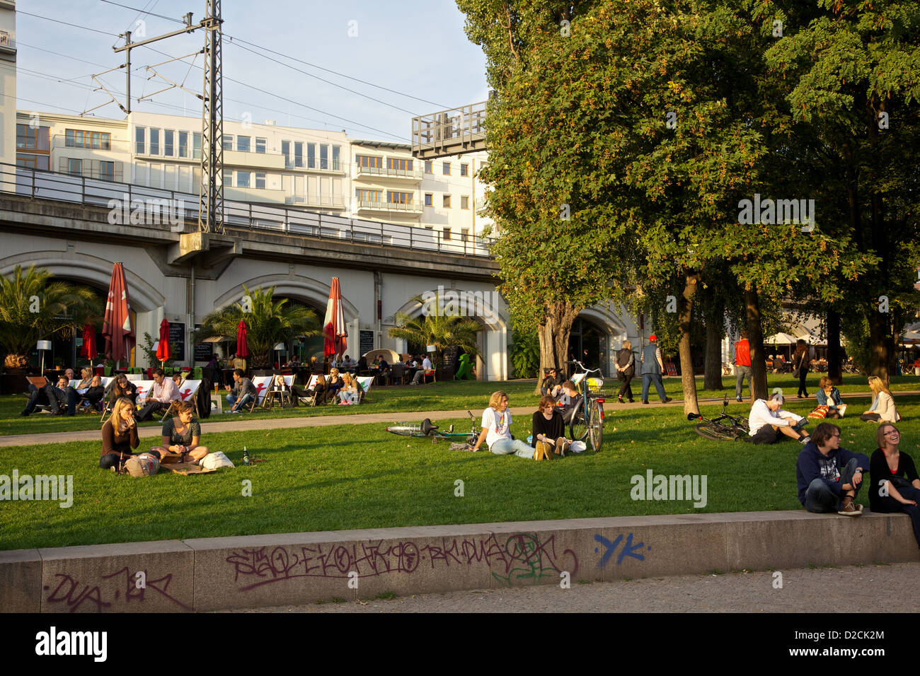 Young people relaxing in James Simon Park, Berlin Gremany Stock Photo