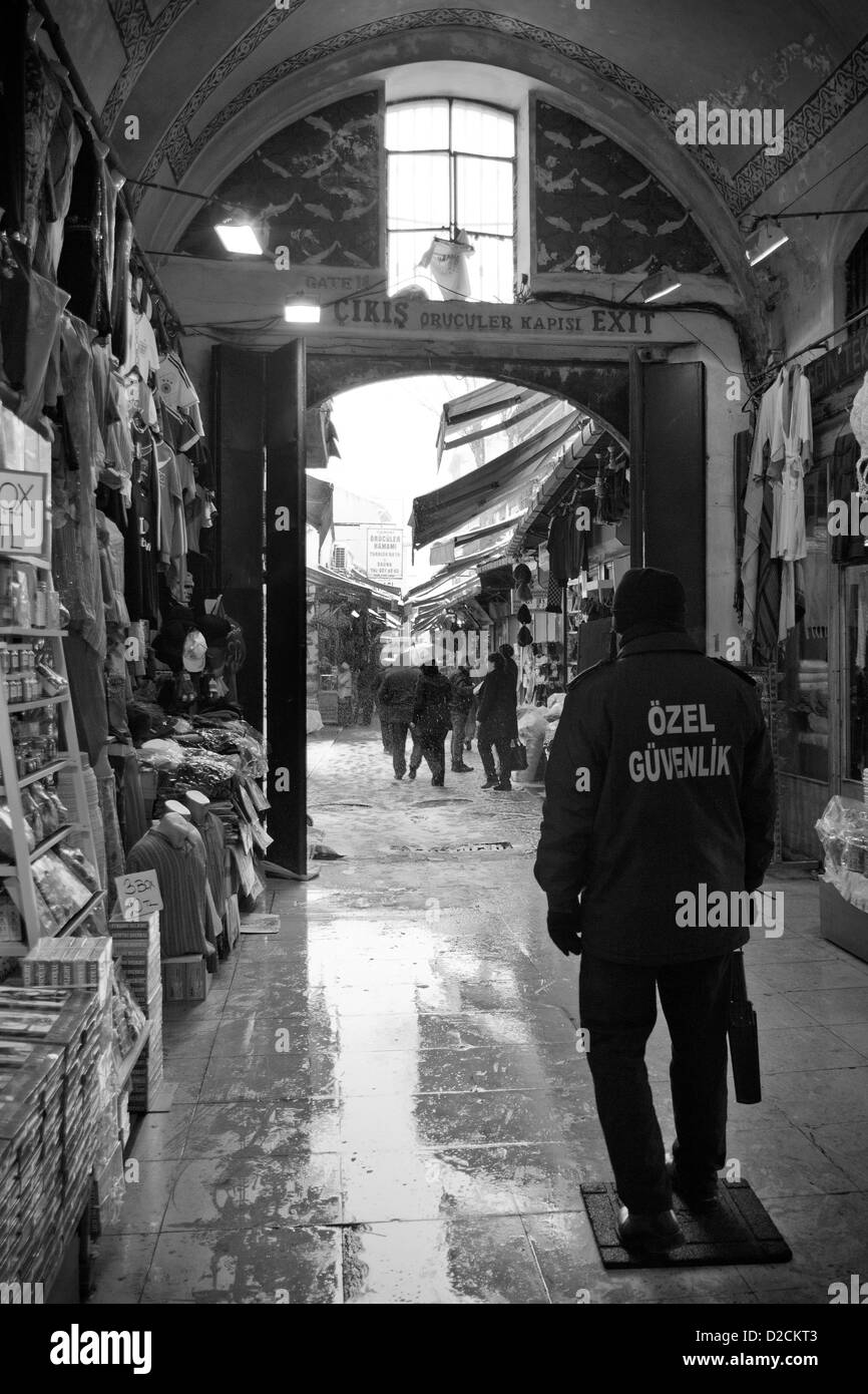ISTANBUL TURKEY - Security guard looks at the snow falling out of Grand Bazaar Kapali Carsi Kapalicarsi ( Covered Market ) Stock Photo