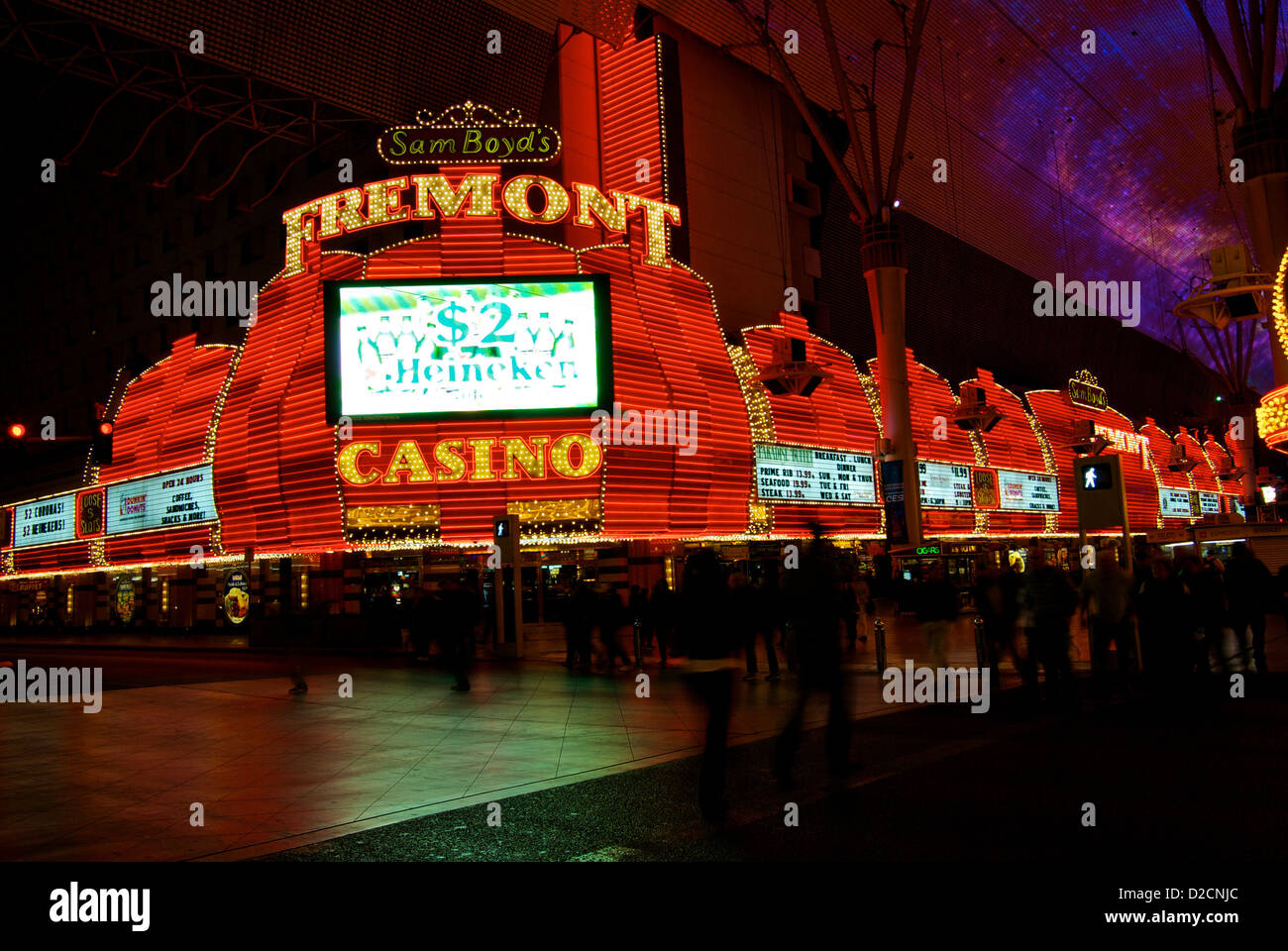 Gaudy glaring neon lights Sam Boyd's Fremont Street Casino old Las Vegas downtown Stock Photo