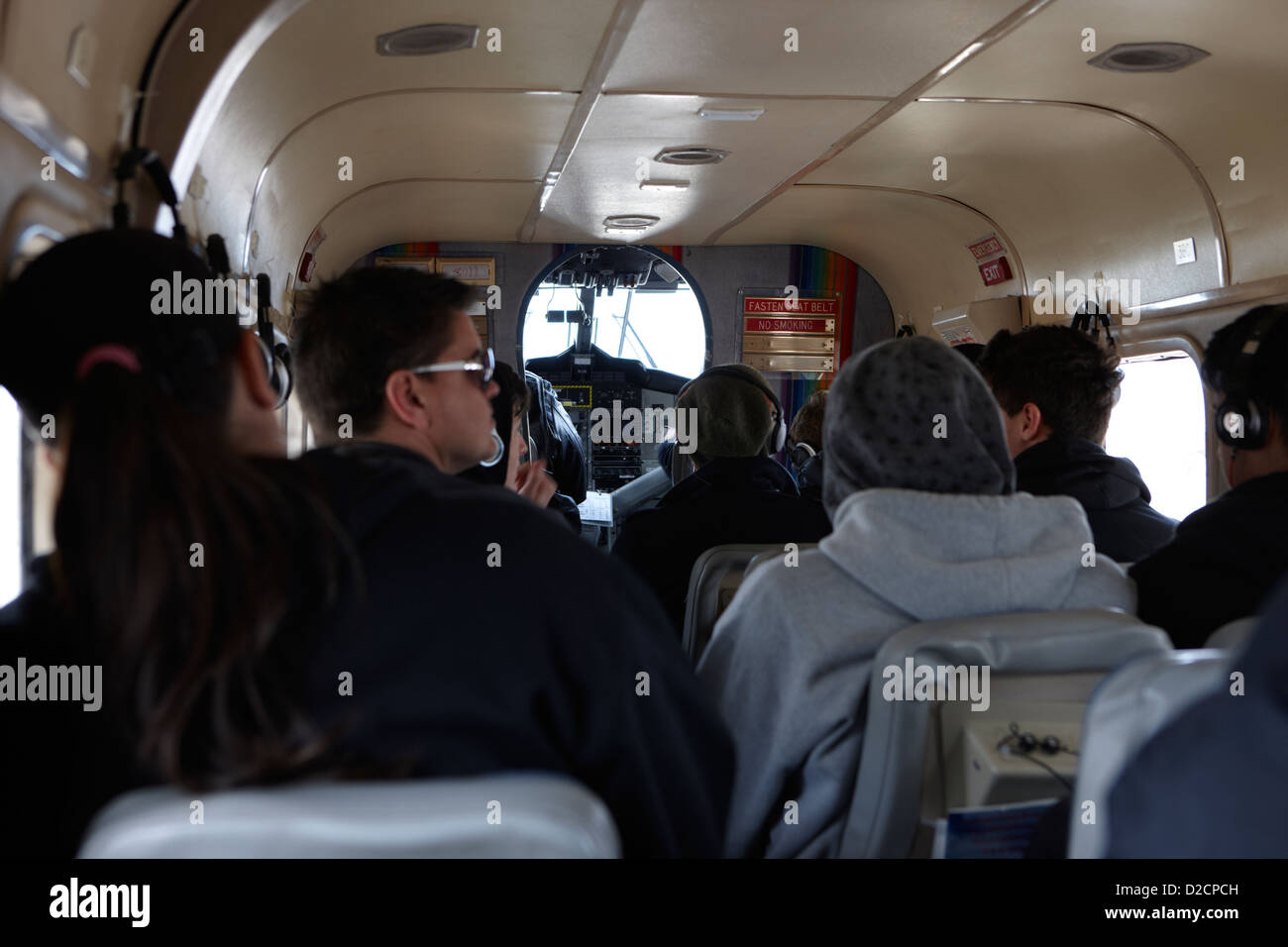 passengers on board dehaviland twin otter light aircraft sightseeing flight to grand canyon Stock Photo