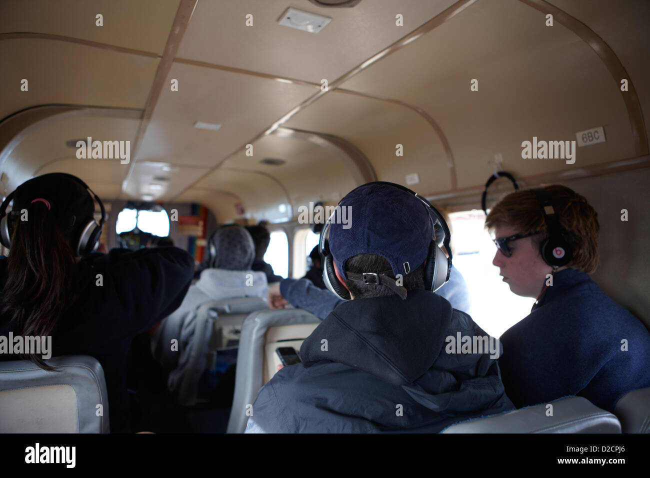 passengers on board dehaviland twin otter light aircraft sightseeing flight to grand canyon Stock Photo