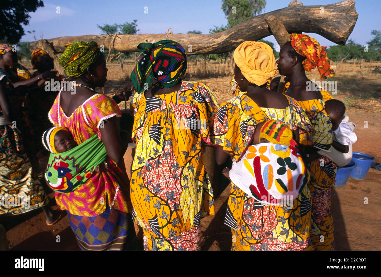 Women in Mali, West Africa, wearing their traditional robe dress called a boubou with matching head scarf. Stock Photo