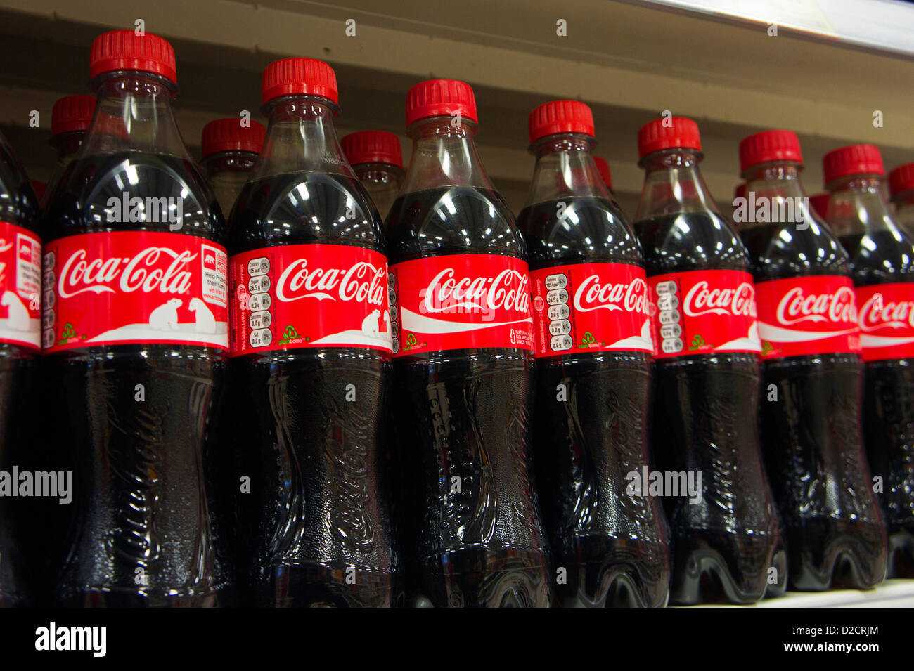 plastic bottles of coca cola in a uk supermarket Stock Photo