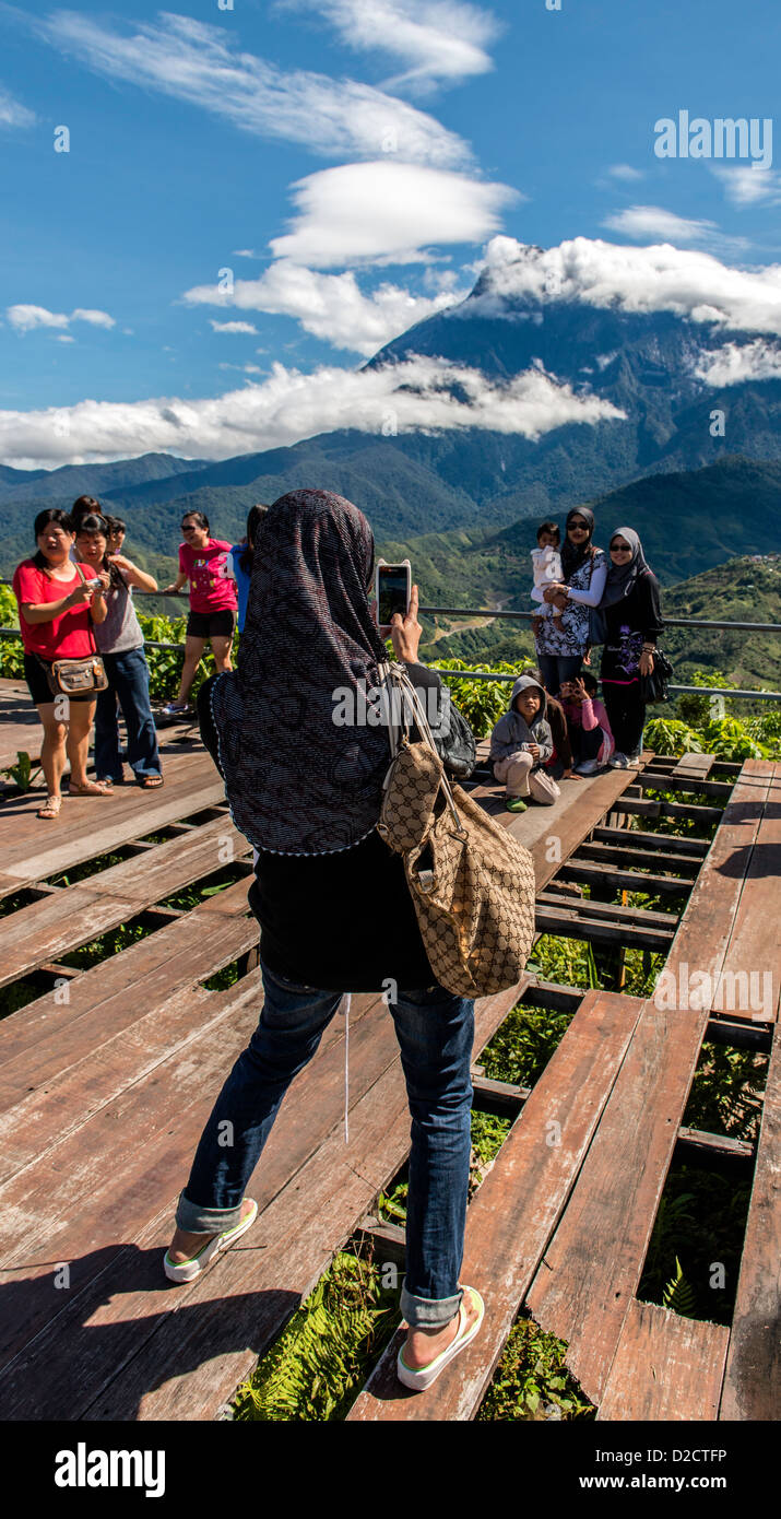 Tourists taking pictures Kota Kinabalu mountain Sabah Borneo Malaysia Stock Photo