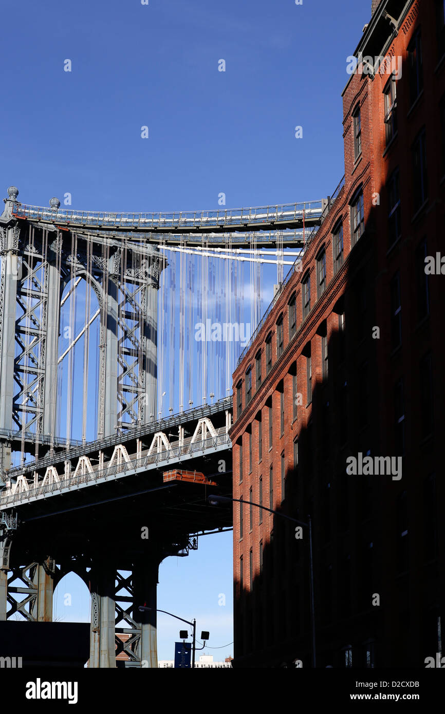 Looking up at the Manhattan Bridge from the DUMBO (Down Under the Manhattan Bridge) Area, New York City, NY, USA, Stock Photo