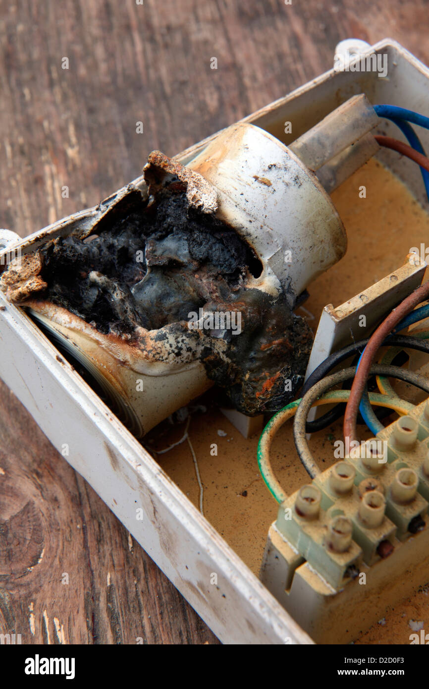 Explosive capacitor failure in borehole electric motor pump control unit Stock Photo