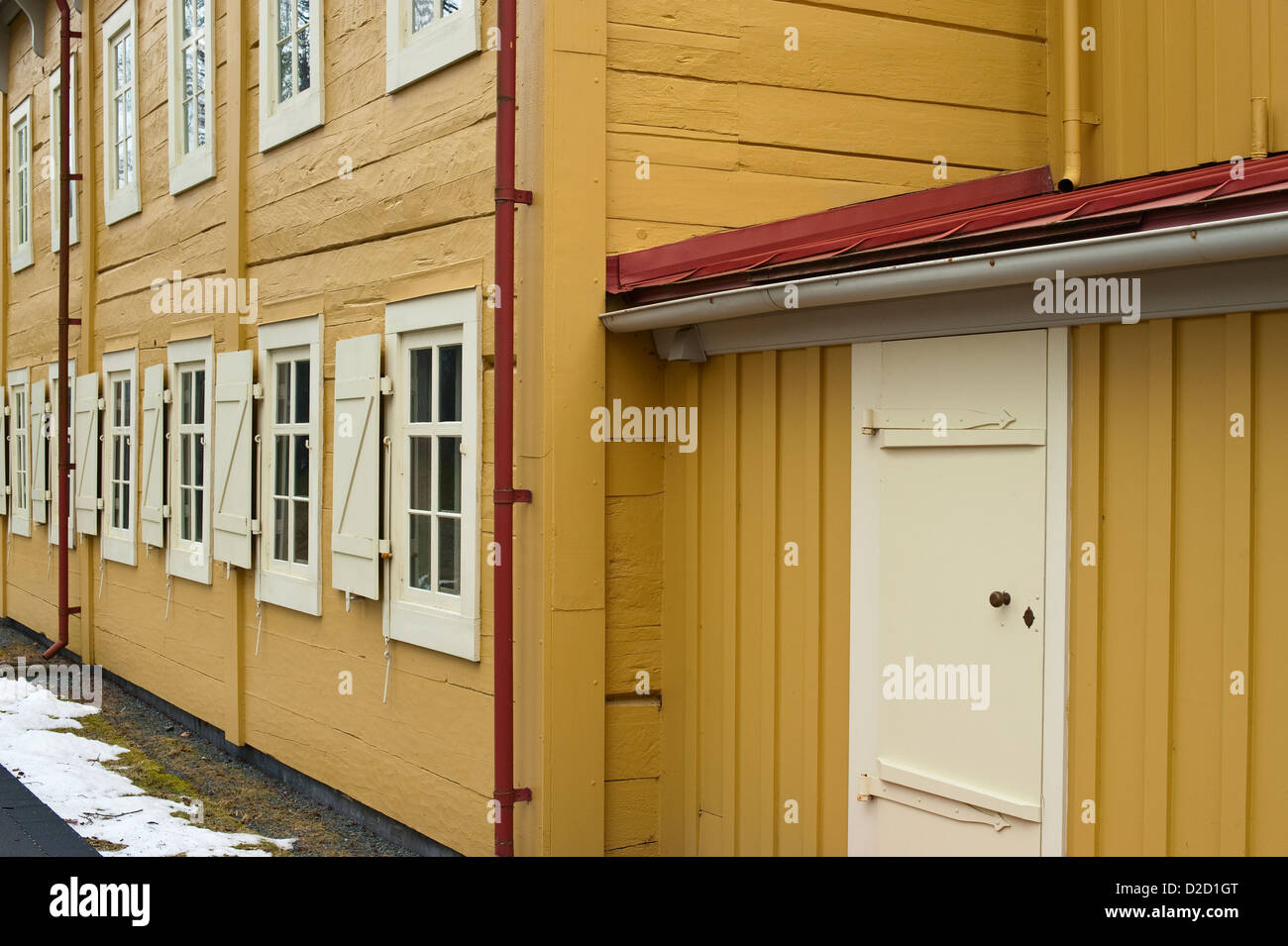 Back side of the Russian House showing windows and door in Sitka