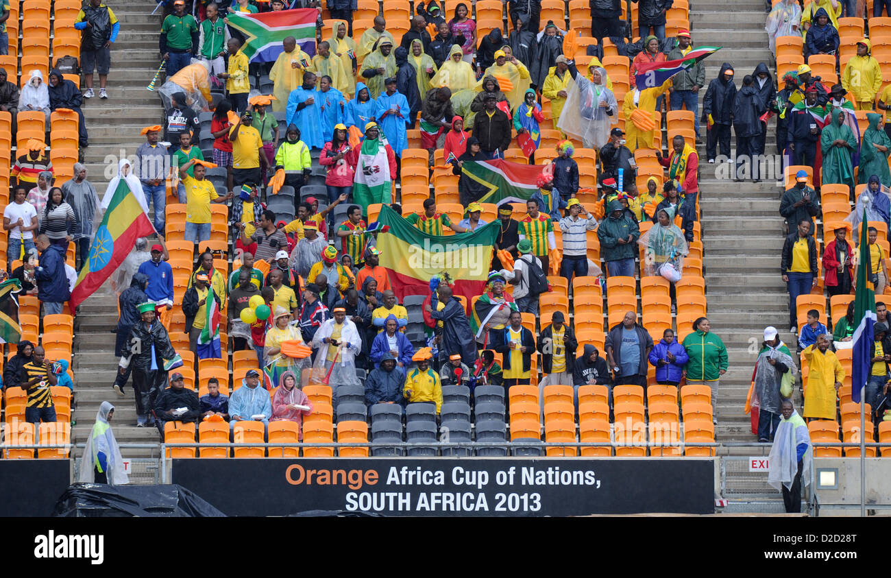 SOWETO, SOUTH AFRICA: Fans watching the opening ceremony of the 2013 African Cup of Nations on January 19, 2013 in Soweto, South Africa. President Jacob Zuma officially opened the Afcon tournament at Soccer City, which kicked off with Bafana Bafana playing Cape Verde. (Photo by Gallo Images / Foto24/ Christiaan Kotze) Stock Photo