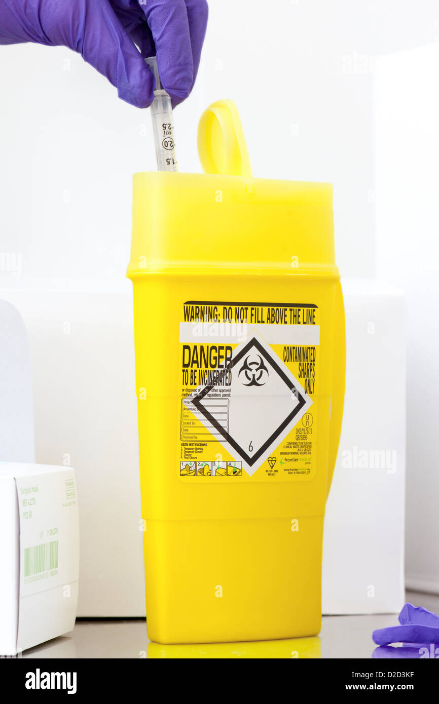 MODEL RELEASED Clinical waste disposal Stock Photo