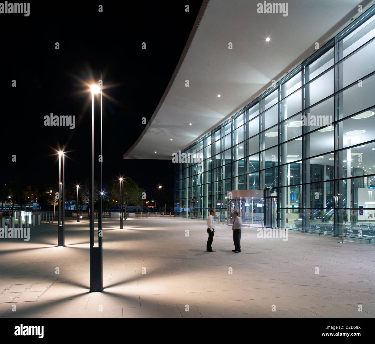 Gibraltar Airport, Gibraltar, United Kingdom. Architect: Bblur Architecture, 2012. Detailed perspective of arrival area at night Stock Photo