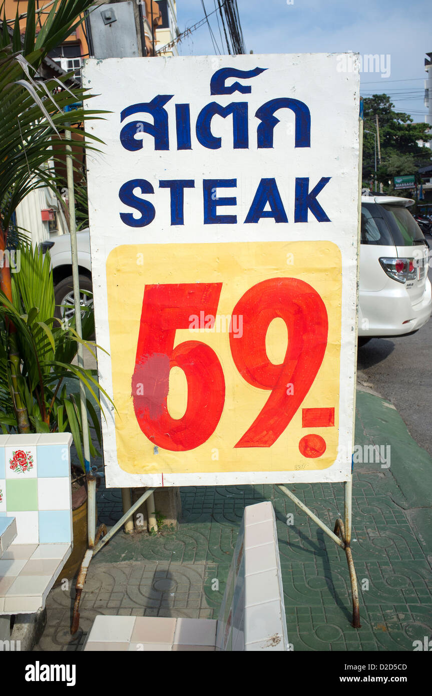 Steak Restaurant sign with altered price Stock Photo