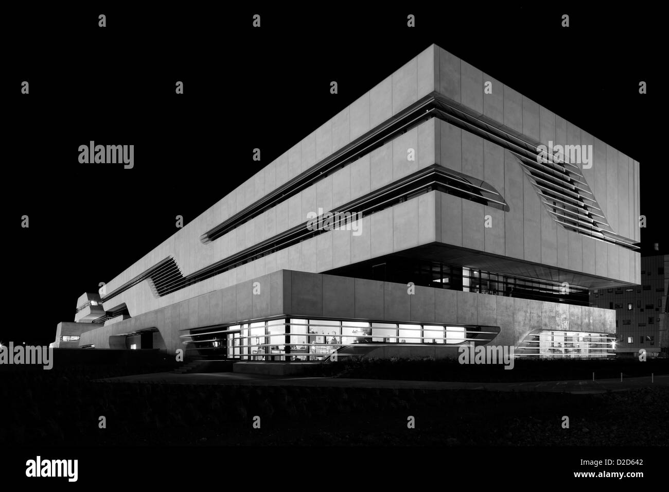 Pierres Vives, Montpellier, France. Architect: Zaha Hadid Architects, 2012. Night time exterior. Stock Photo