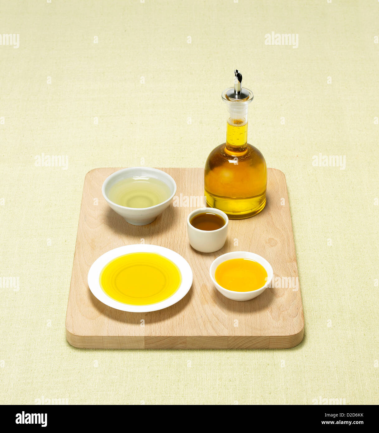 Selection of bottled oils cut out white background Stock Photo
