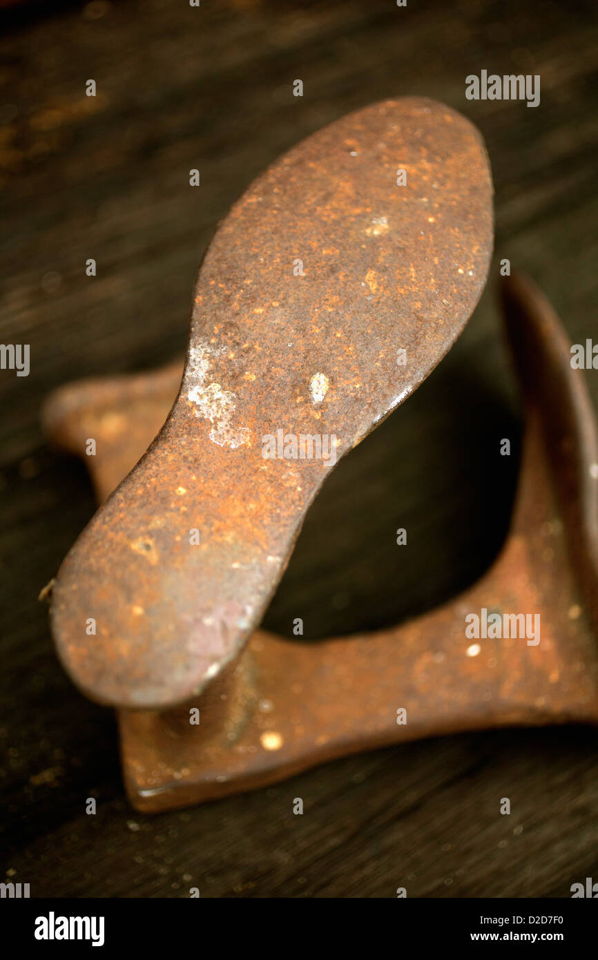 An old metal shoemakers tool Stock Photo