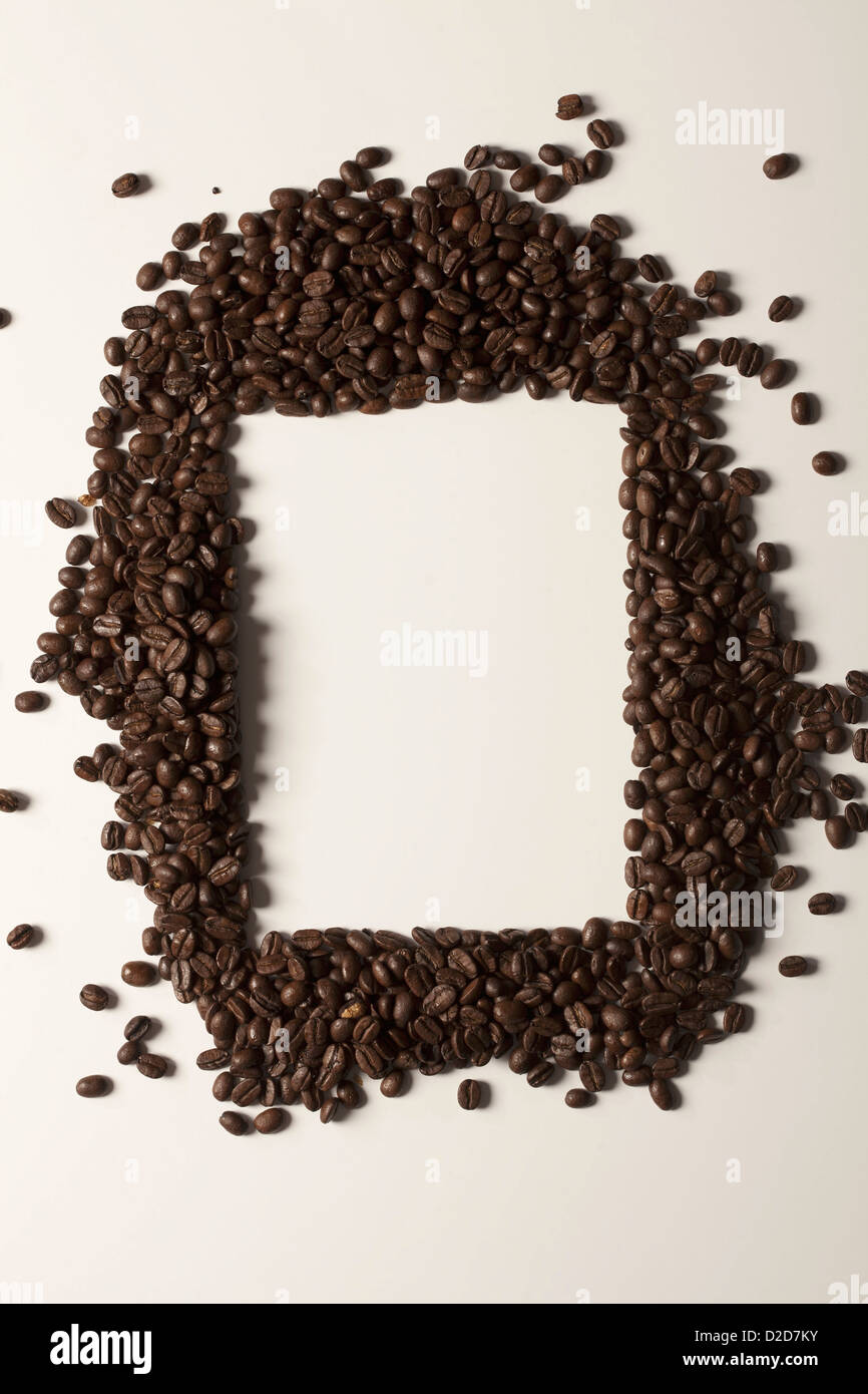 Coffee beans arranged around a rectangle shape Stock Photo