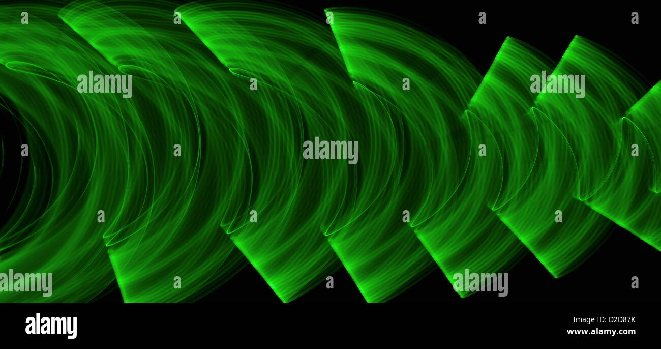 Green light trails creating an abstract wave pattern on a black ...