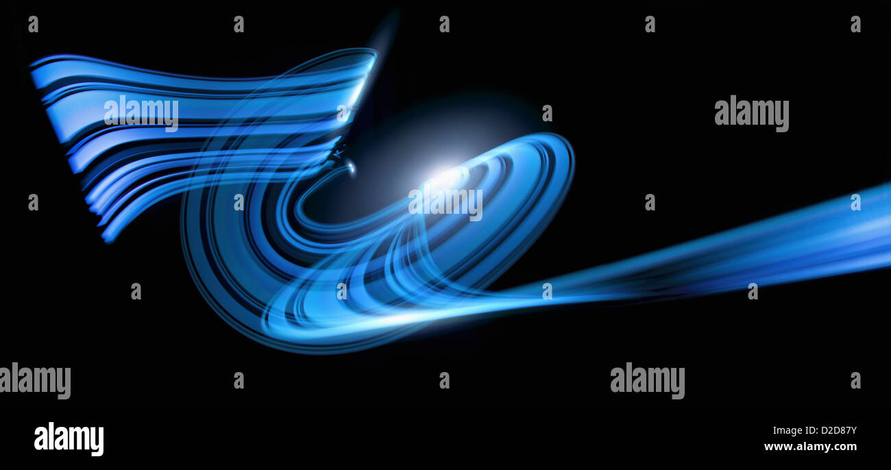 Light trails creating an abstract blue wave pattern on a black ...