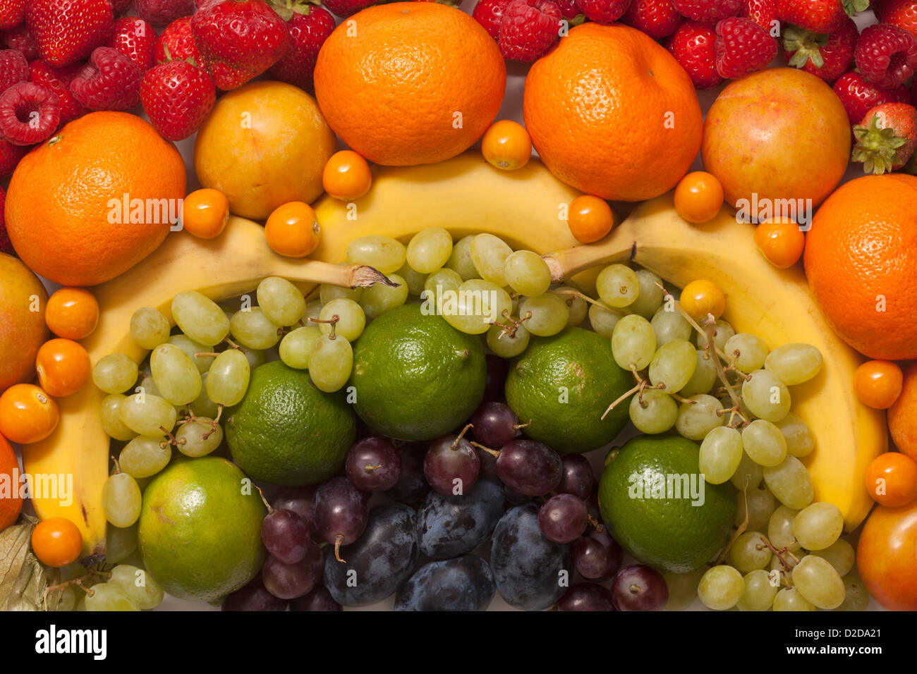 An abstract arrangement of various fresh fruits, full frame Stock Photo