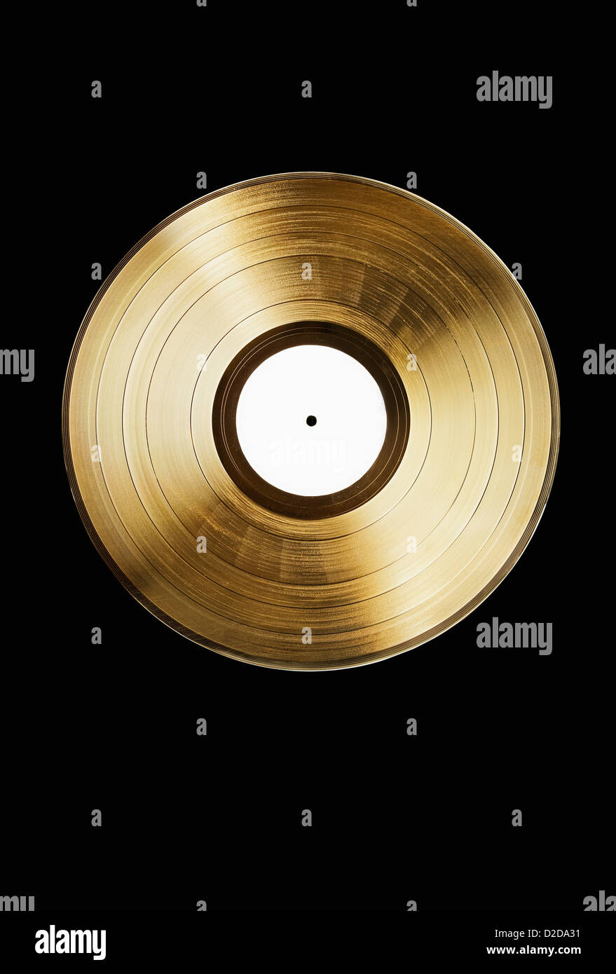 A gold record on a black background Stock Photo