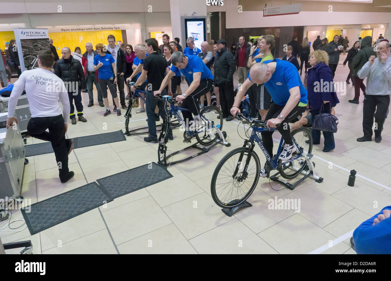 Employees of Durham County Council participating in the Workforce Workfit cycling challenge Eldon Square Newcastle Stock Photo