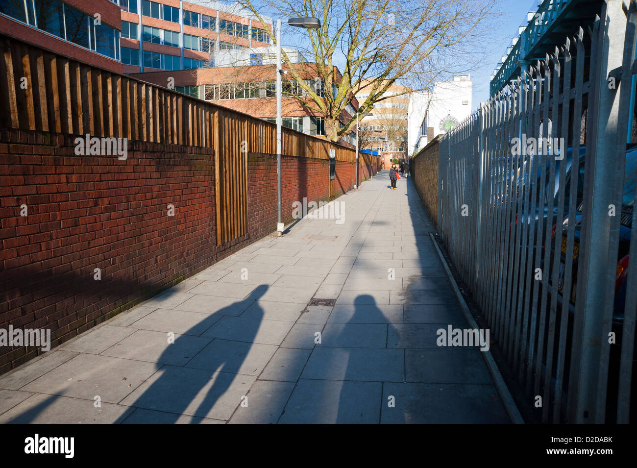 walkway from the new kings road to putney bridge station on a sunney