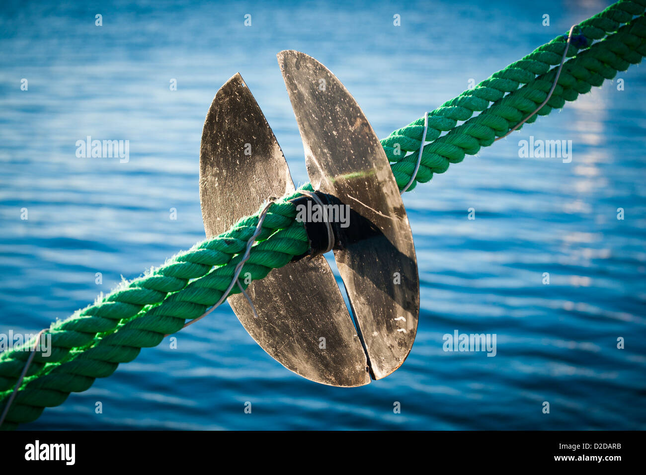 A rat guard on a ship's mooring line Stock Photo Alamy