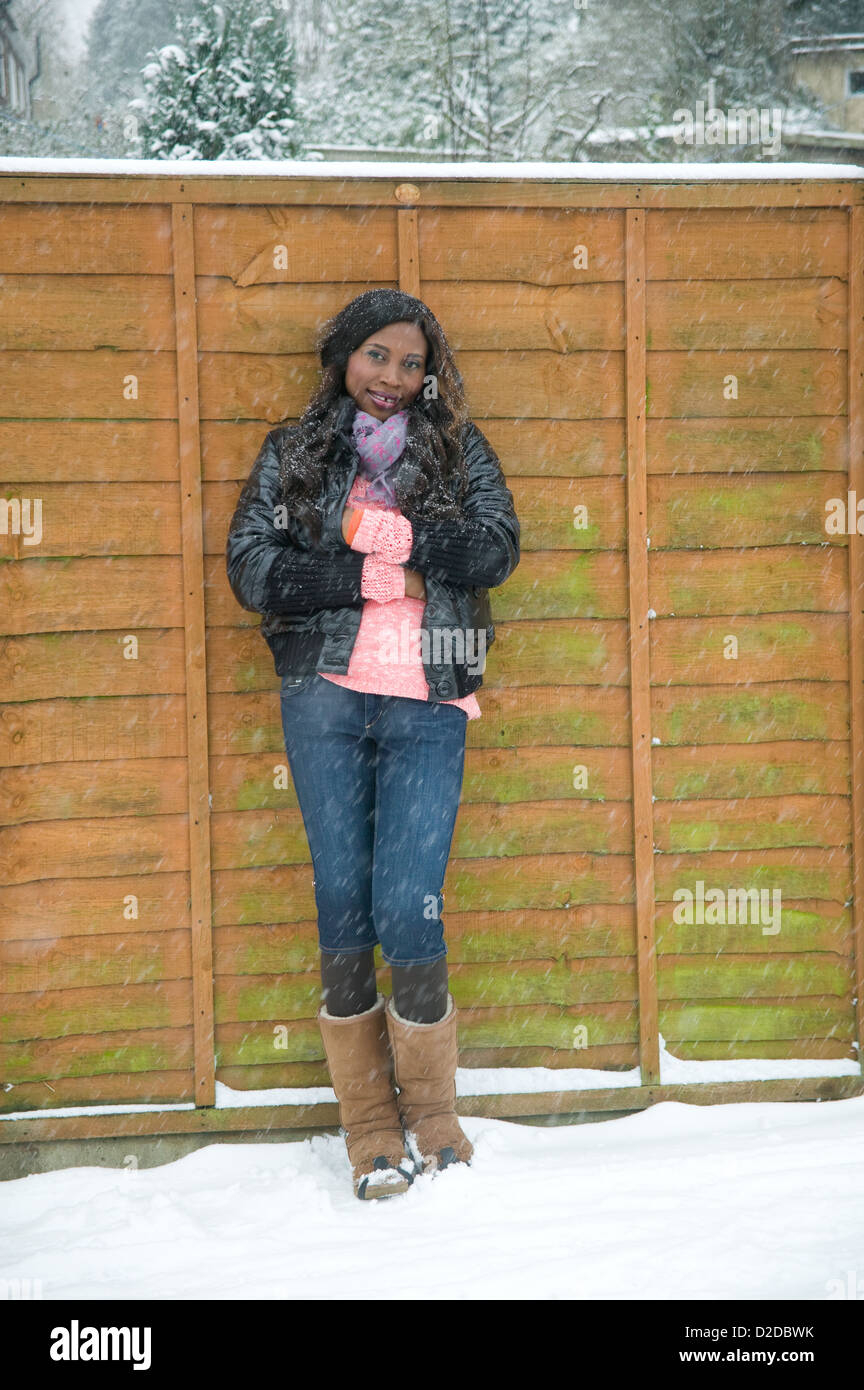 Nigerian Ebo African woman in snowing winter day Stock Photo Alamy