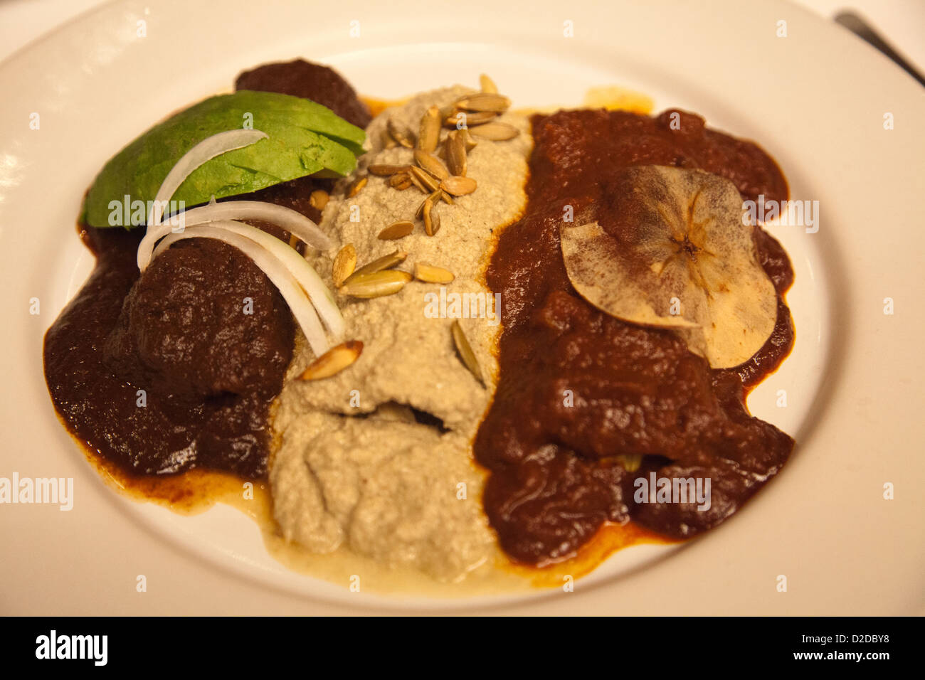 Enchilladas with 3 Mole Sauces -  El Mural De Los Poblanos Restaurant in Puebla - Mexico Stock Photo