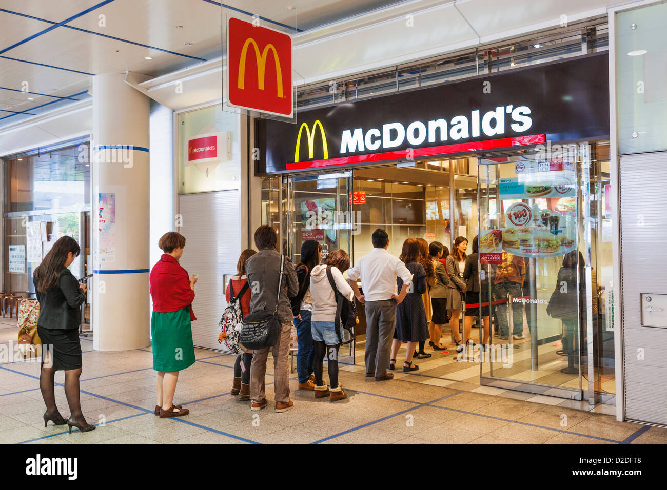 Japan, Honshu, Aichi, Nagoya, Queue of Customers at McDonald's Stock ...