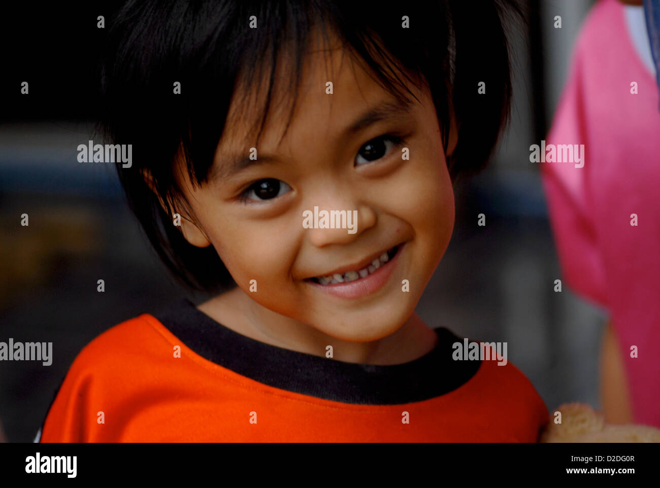 beautiful smiling young thai girl in Koh Chang Thailand Stock Photo - Alamy