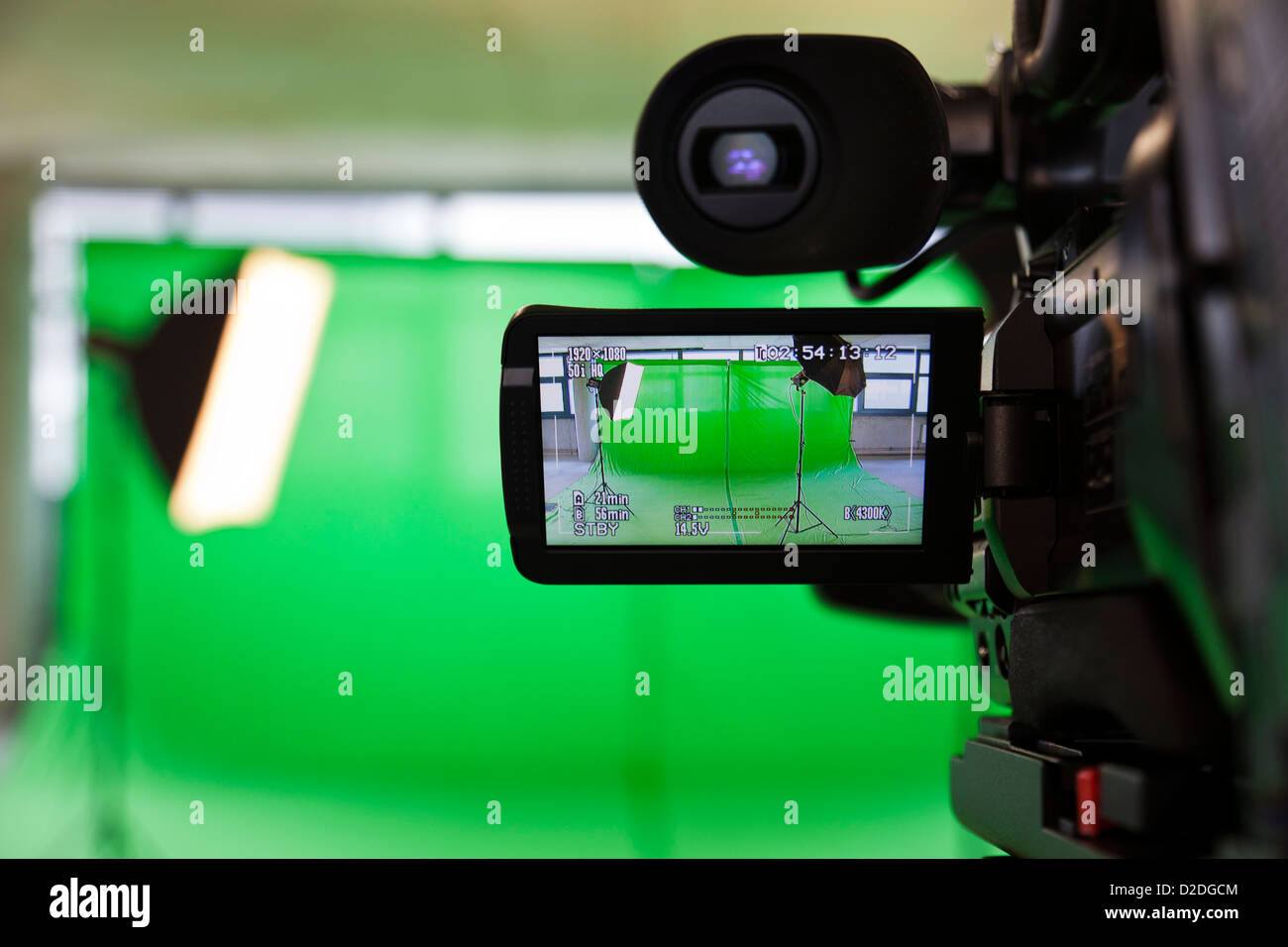 LCD display screen on a High Definition TV camera in a green screen studio. Stock Photo