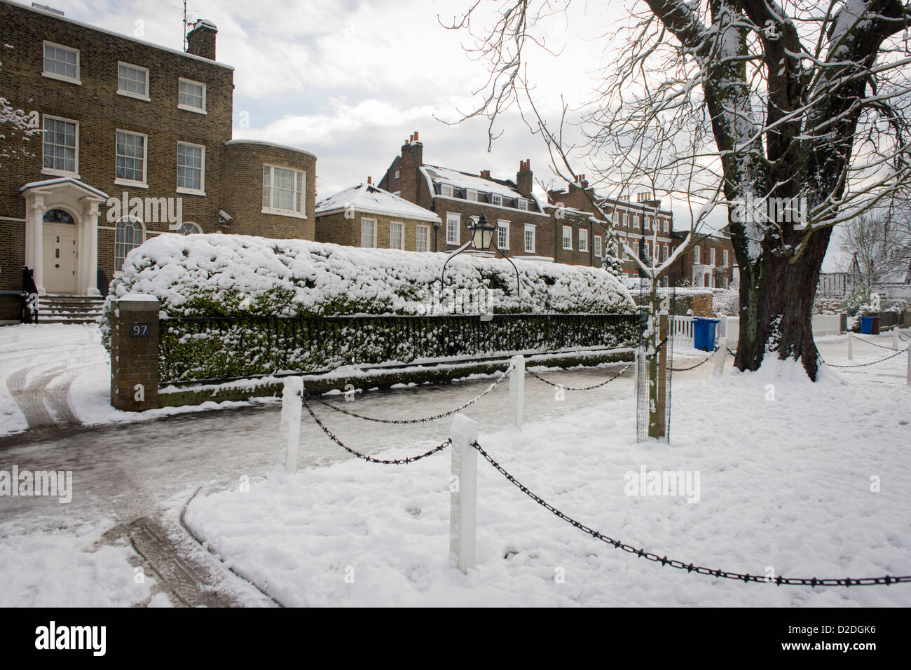 Dulwich Village homes landscape during mid-winter snow. Stock Photo