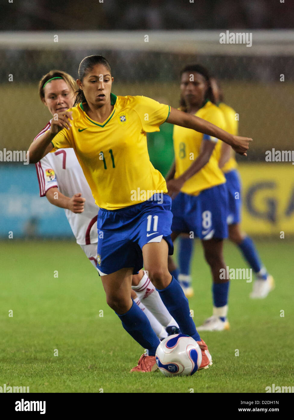 Cristiane of Brazil on the ball during the FIFA Women's World Cup Group D match against Denmark at Hangzhou Dragon Stadium. Stock Photo
