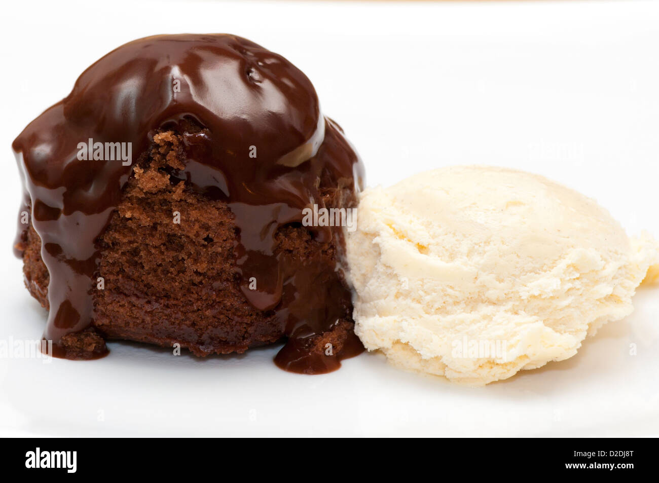 Hot Chocolate Sauce Sponge Pudding with Vanilla Ice Cream Stock Photo Alamy