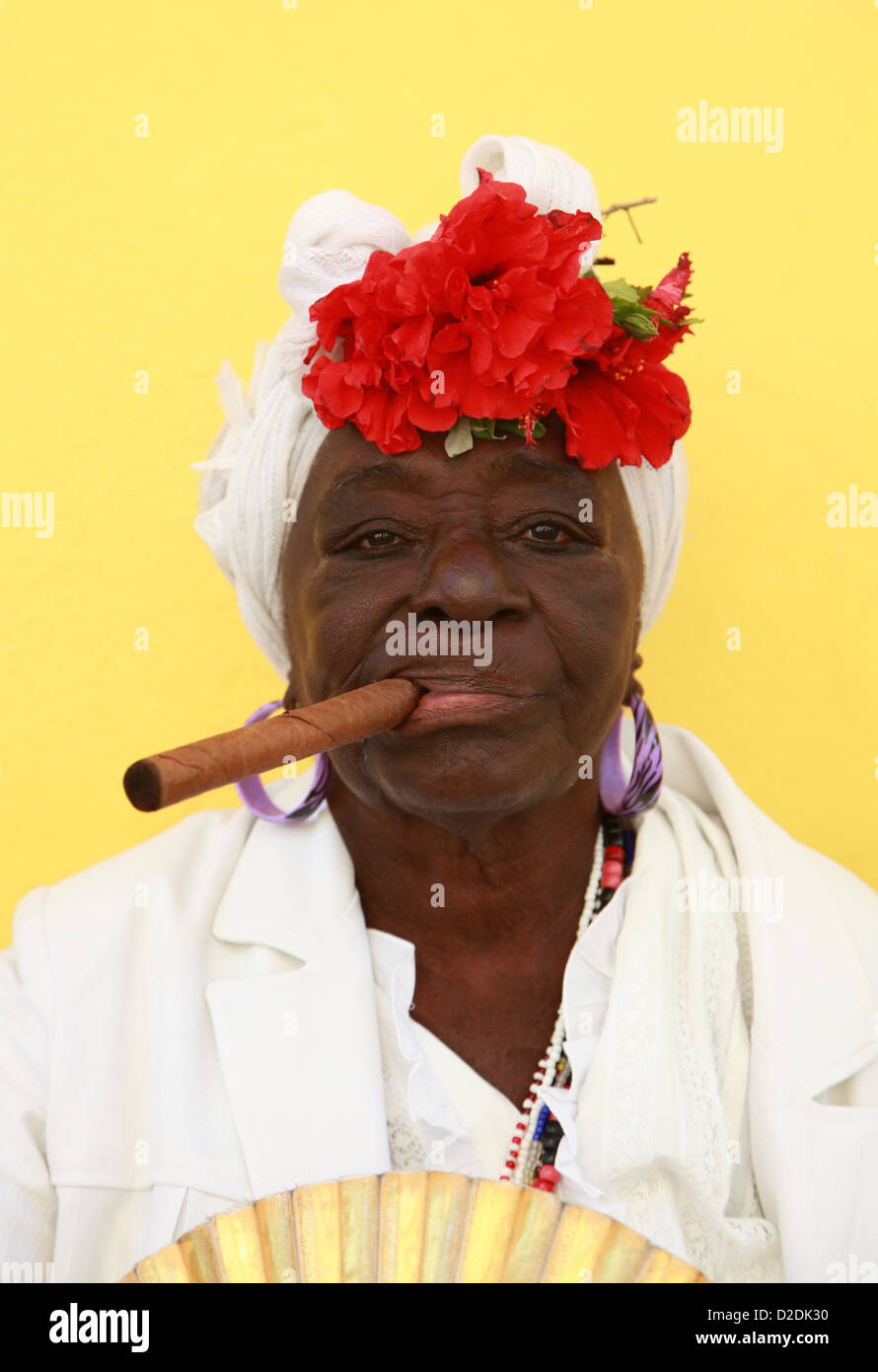 Cuban elderly lady smoking a cigar Stock Photo