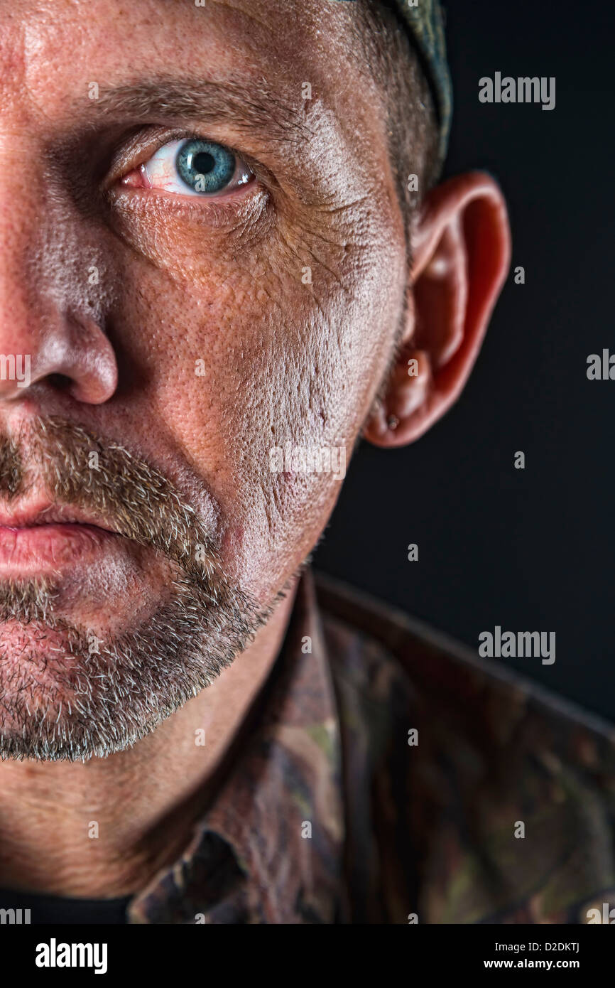 Gritty look, very detailed close up portrait of mature adult, half face, male, 40 years, Caucasian Stock Photo