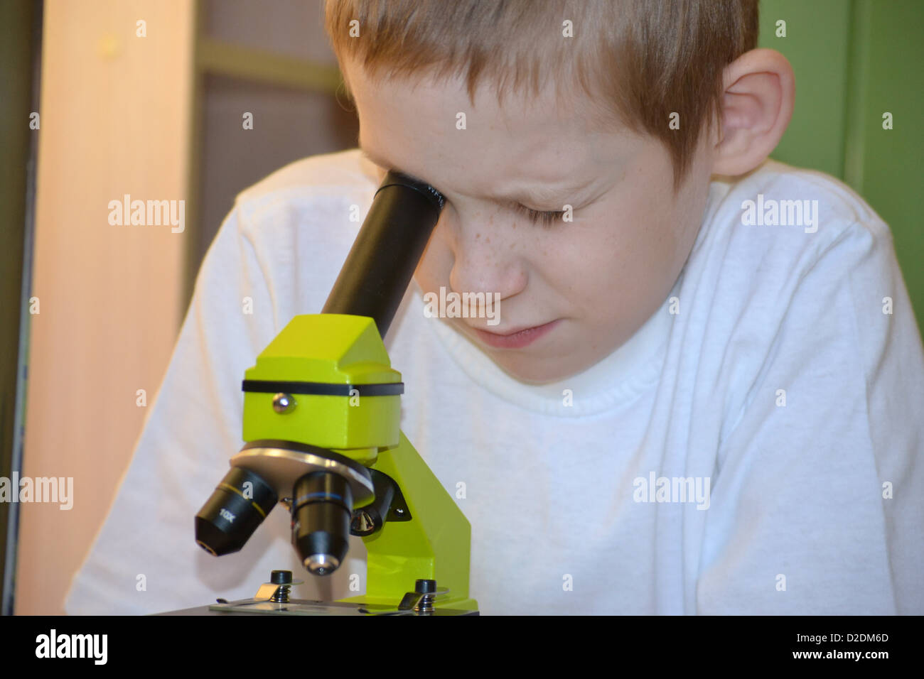 the boy with a microscope Stock Photo