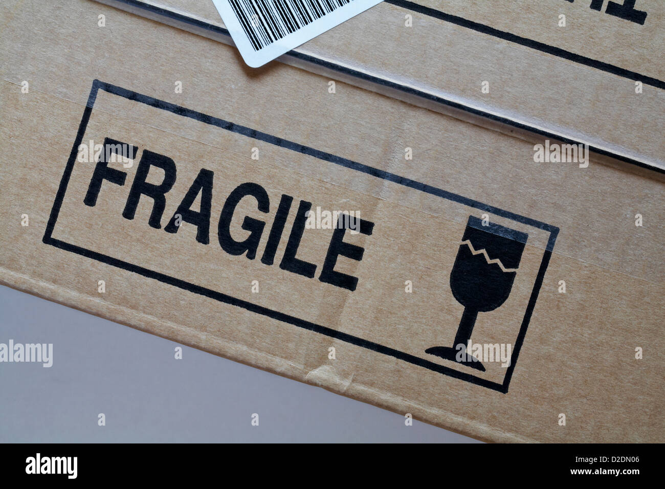Fragile glass stamped on brown cardboard box Stock Photo