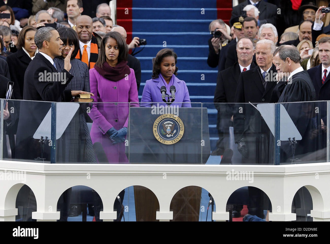 Washington, District Of Columbia, USA.  21st Jan, 2013. President Barack Obama takes the oath of office from Chief Justice John Roberts at the ceremonial swearing-in on the West Front of the U.S. Capitol during the 57th Presidential Inauguration in Washington, Monday, Jan. 21, 2013. (Credit Image: Credit:  Scott Andrews/Pool/Prensa Internacional/ZUMAPRESS.com/Alamy Live News) Stock Photo