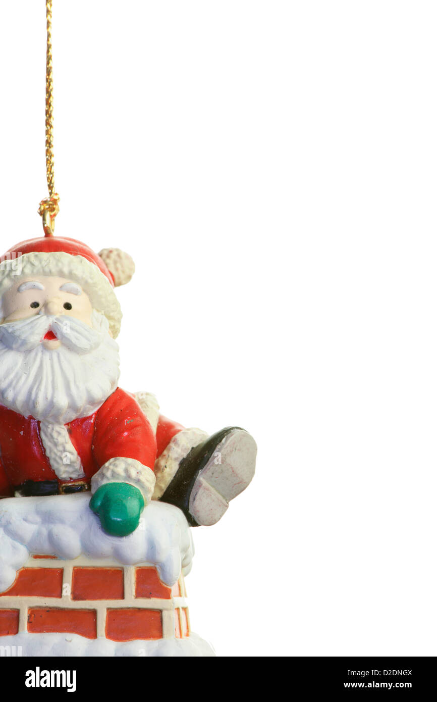 Santa Claus and chimney Christmas decoration on white background Stock Photo