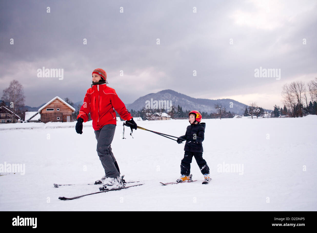 Ski lesson - family on snow. Slovenia Julian Alps. Stock Photo