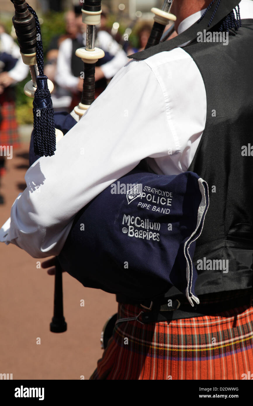 A member of the Strathclyde Police Pipe Band performing at the Piping Live Event in George Square, Glasgow, Scotland, UK Stock Photo