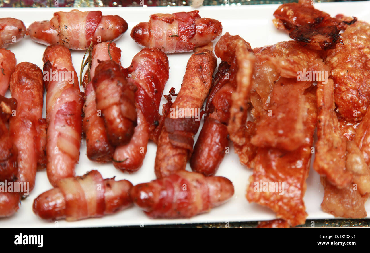 pigs in blankets and pork crackling Stock Photo