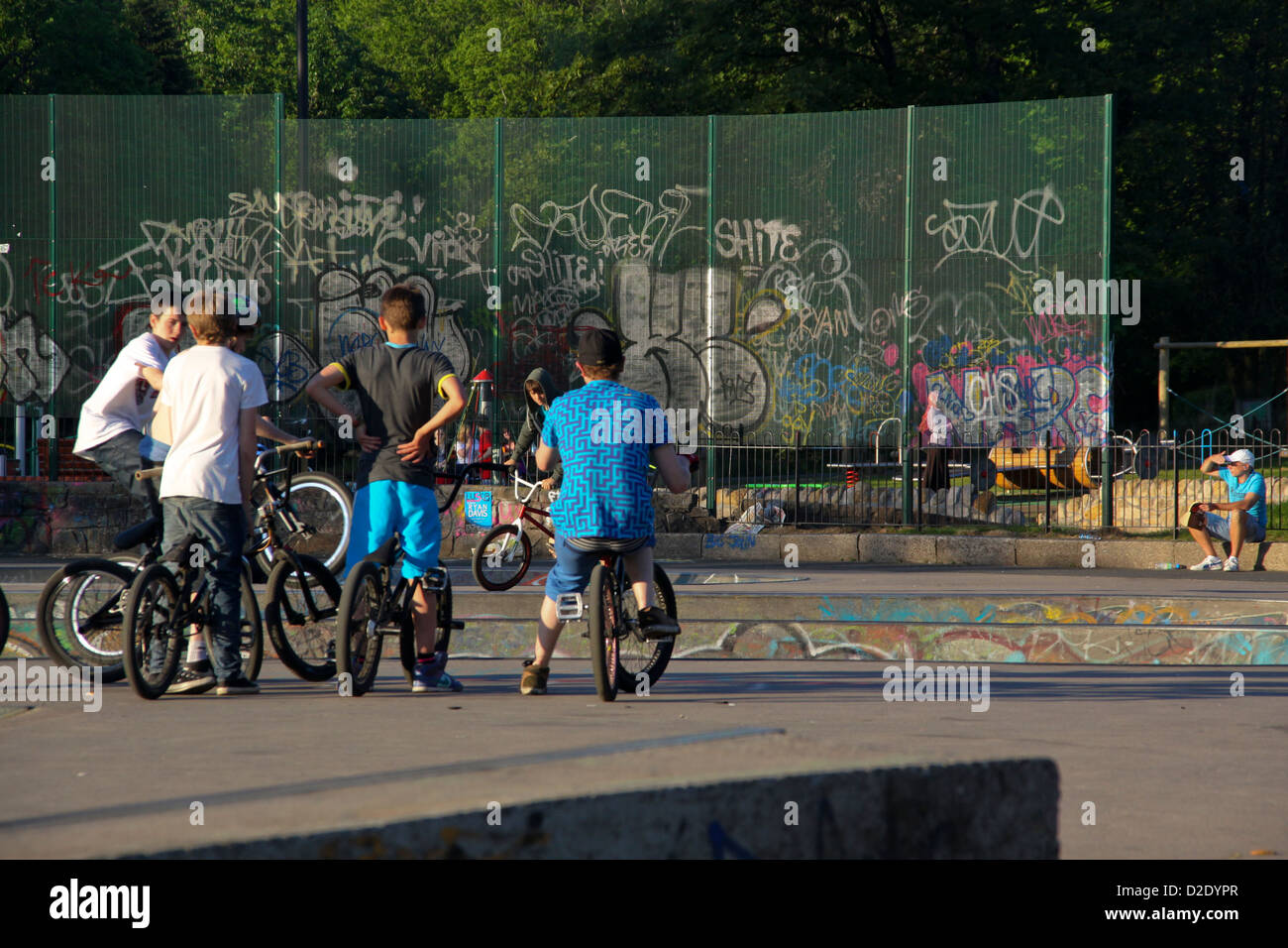 Kids on BMX bikes in skatepark Stock Photo