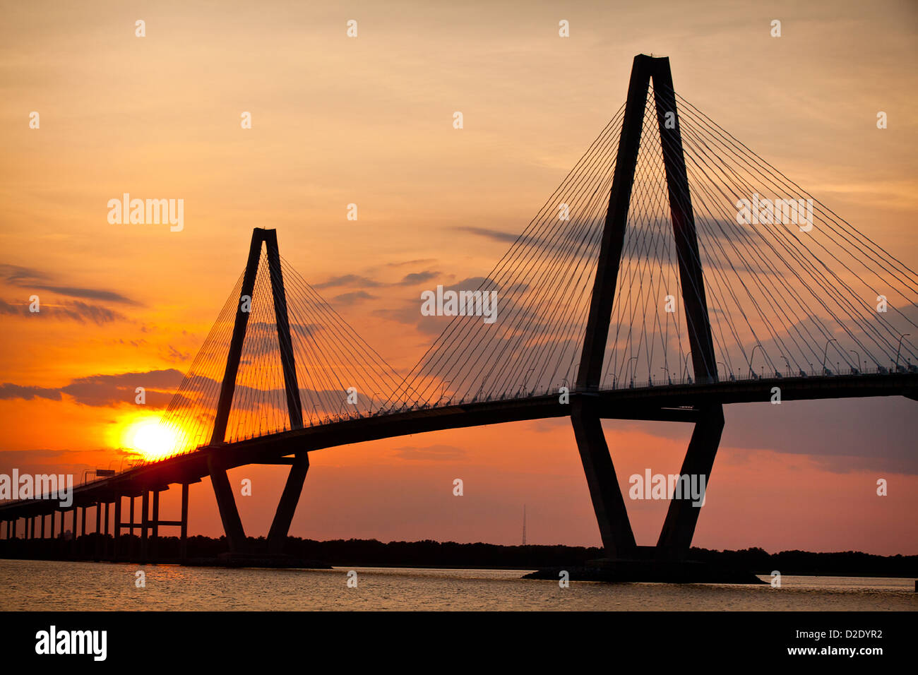 Sunset over the Arthur Ravenel Jr. bridge in Charleston, SC Stock Photo
