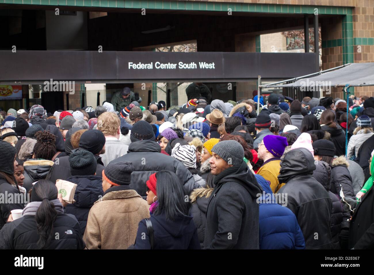 January 21, 2013, Washington DC. A crowd of people squeezes into the Federal Center South West Metro station after the 57 Presidential Inaugural marking the beginning of President Obama's second term. Stock Photo