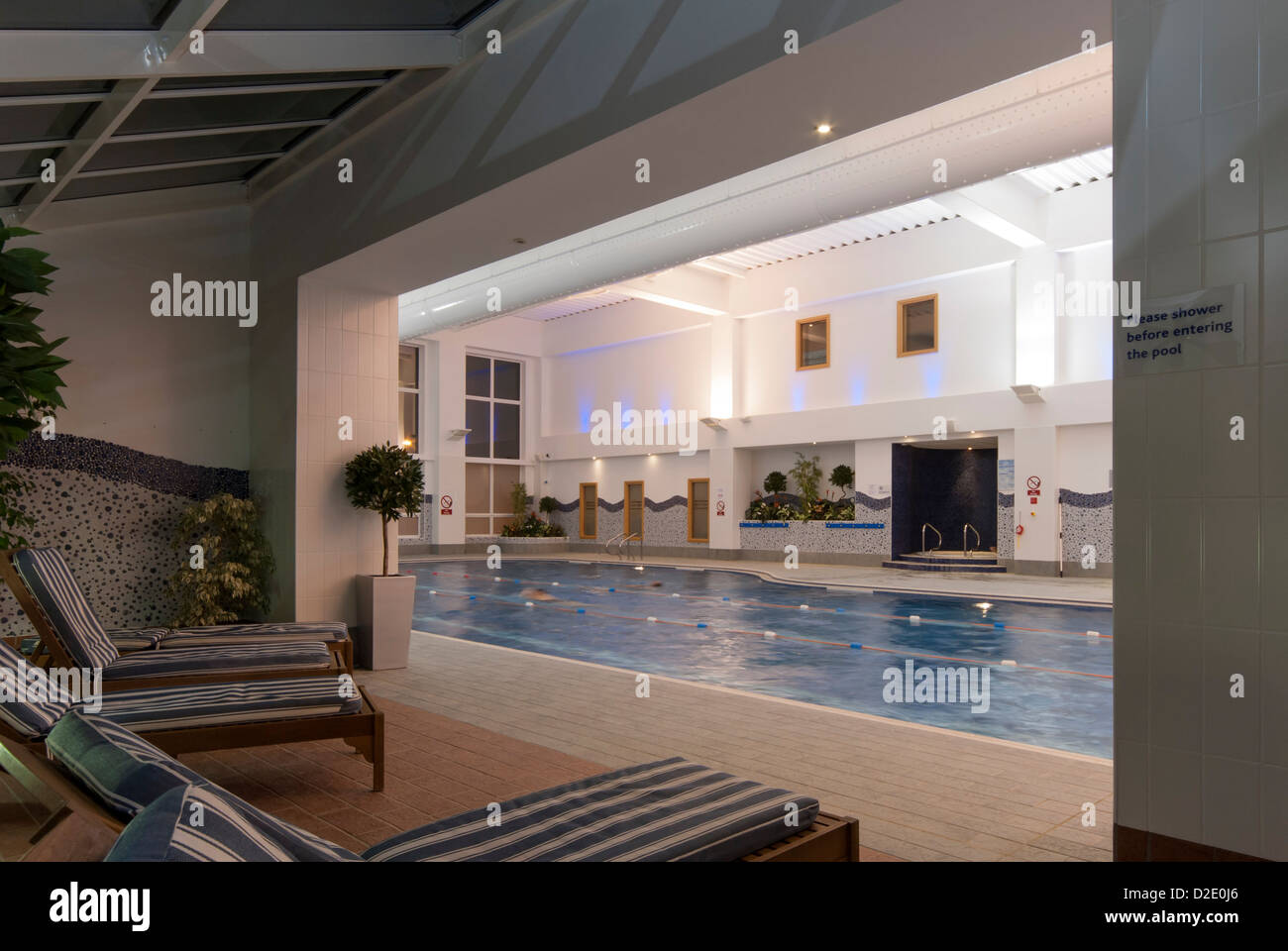 Hotel leisure centre swimming pool and loungers at De Vere Hotel