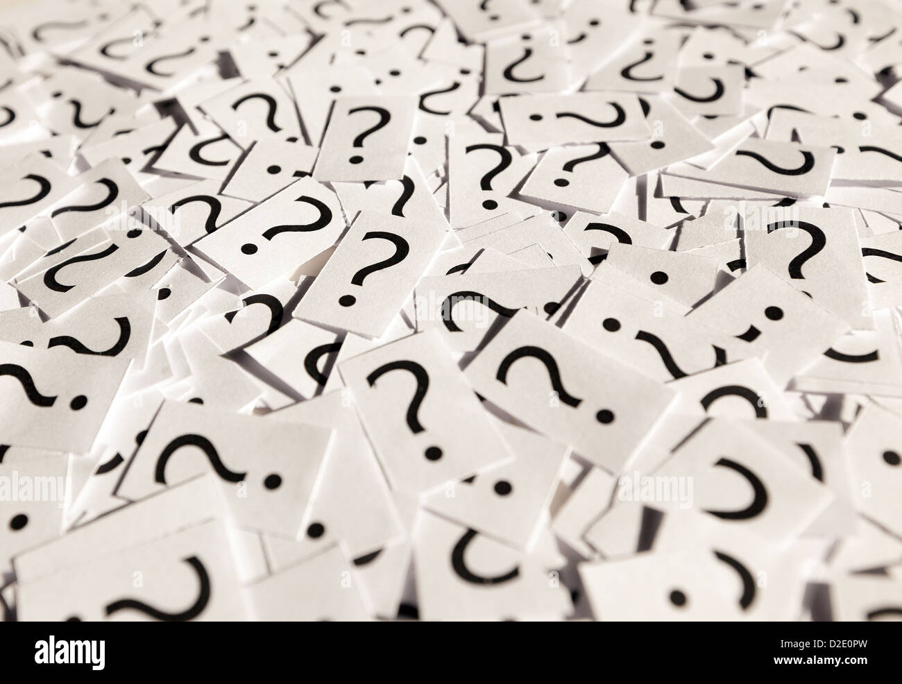 Just a lot of question marks on white papers Stock Photo - Alamy